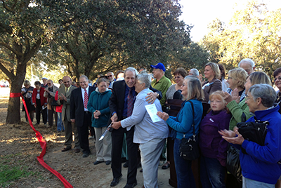 Sheley at a ribbon cutting