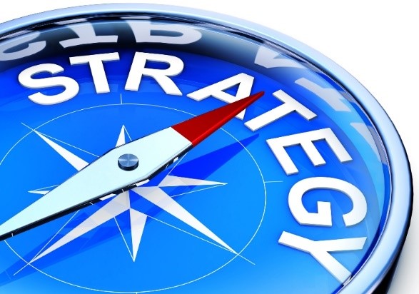 compass pointing to word "strategy"