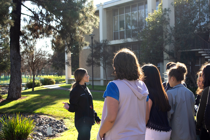 University ambassador giving a group of students a tour