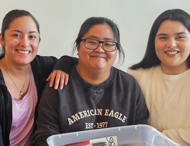 Three MSW students pose for a group photo