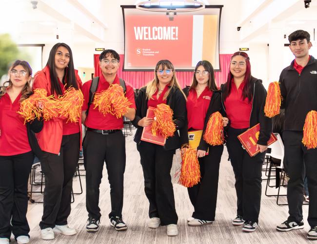 Seven orientation leaders pose for a group photo