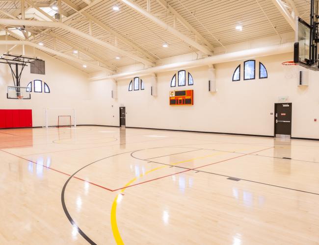 Indoor basketball court with hardwood floor