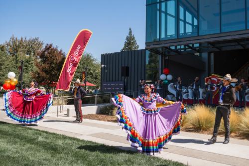 Baile folklórico dancers in front of the University Student Center