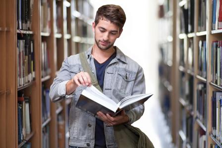 Student reading in the library