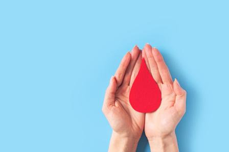hands holding a droplet