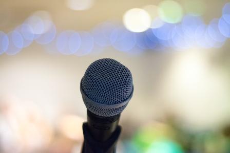 Microphone with lights in the background