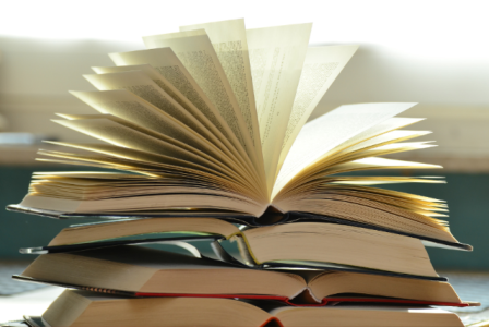 books stacked on top of each other