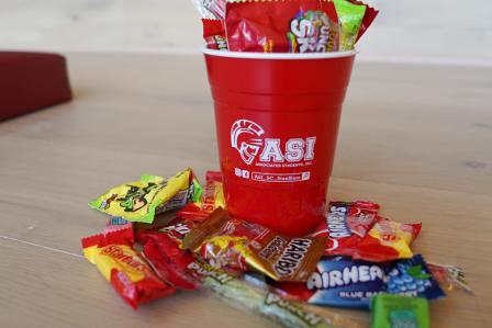 ASI cup with candy overflowing