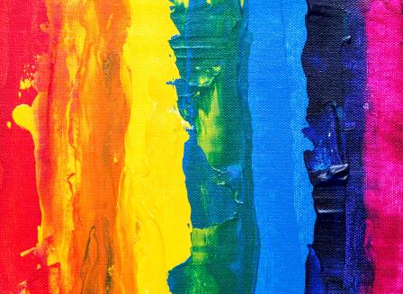 Paint arranged in a rainbow