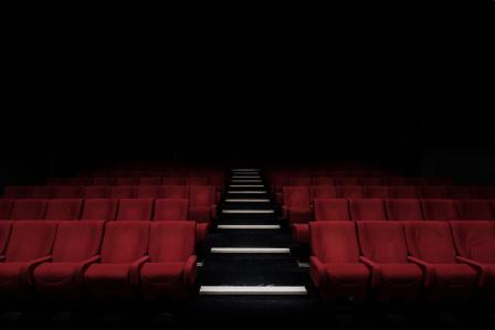Movie theatre seats in the dark