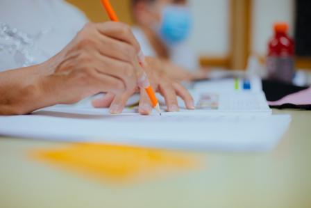 Hand writing with a pencil