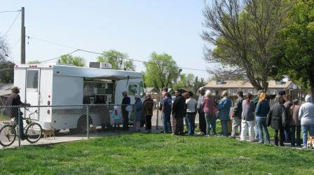 People Lining Up for the USF Truck