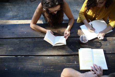 students writing and discussing