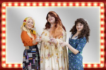 Promotional Image for Vanities: Three people standing together and smiling
