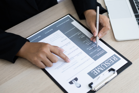 Someone looking at a resume