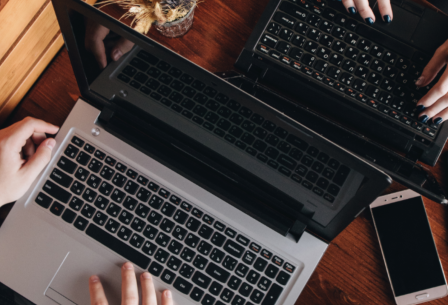 Two computers on a table