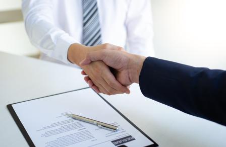 two people shaking hands