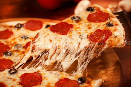 a cheesy slice of pepperoni pizza 