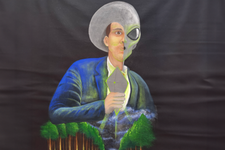 A painting depicting a human with an alien silhouette. It's holding an ominous glowing stone.  