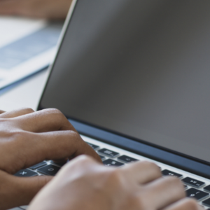 Person typing on a computer