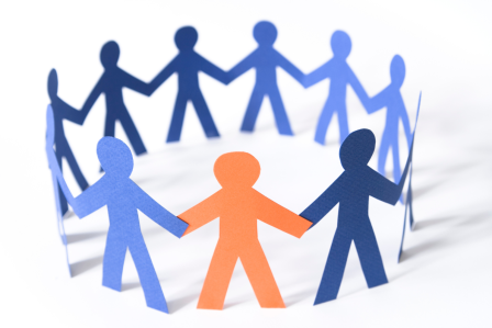 human figures holding hands in a circle