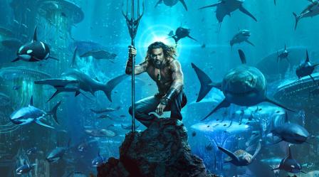 aquaman the character, with sharks swimming behind him