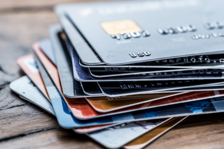 a stack of credit cards, slightly spread out like cards. 