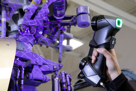 Close up of a black scan tool being used.