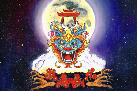 Dragon head with a moon shining in the background.