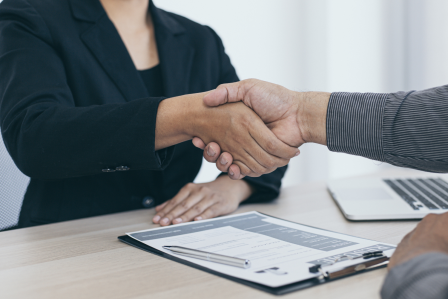 Two people shaking hands