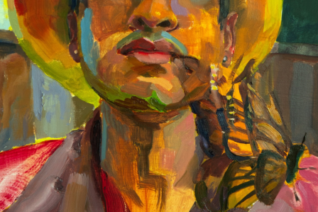 Close up of El Trabajador with a butterfly.