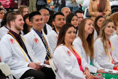 A crowd of Stan State nursing students sat at a conference