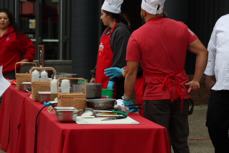 Community members cooking a meal