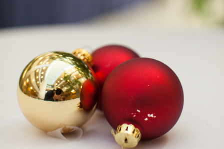 Three Christmas ornaments.