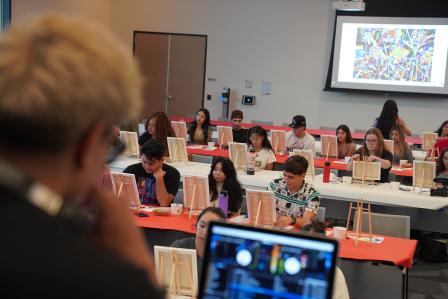 students painting
