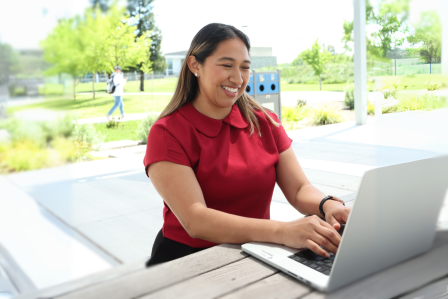Person typing on computer