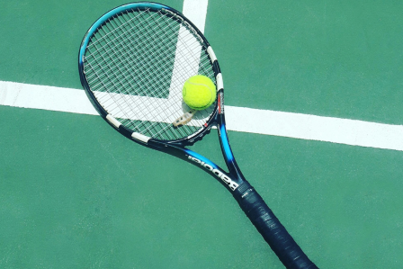 Tennis racket and ball