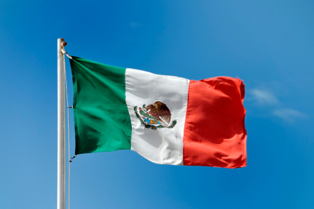 Mexican flag waving on a pole