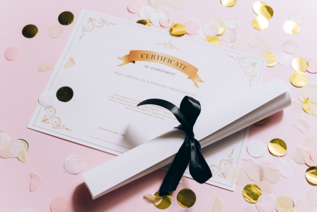 Certificate of Achievement surrounded by confetti