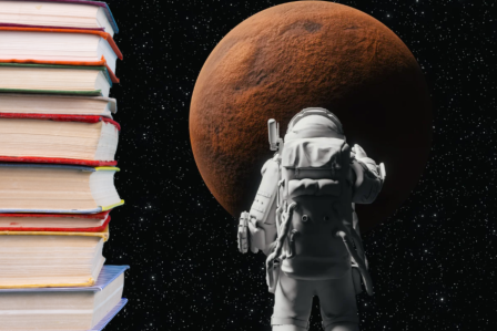 Stack of books next to an astronaut