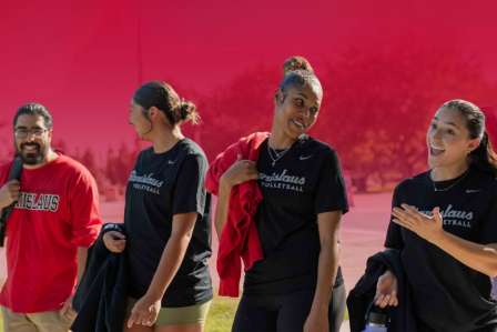 Students walking in Stan State merchandise