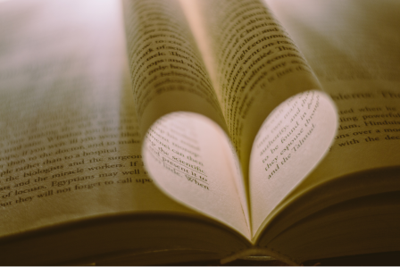 Book pages folded into a heart