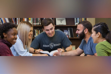 A group of five students sit at Learning Commons-Spring Into Study event