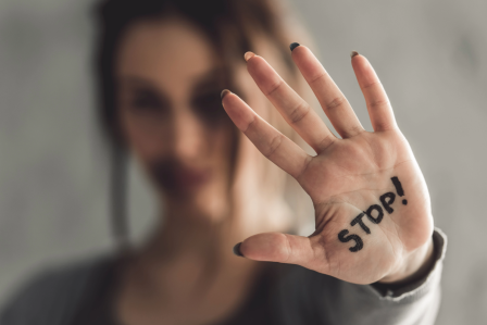 Hand with the word "STOP!"