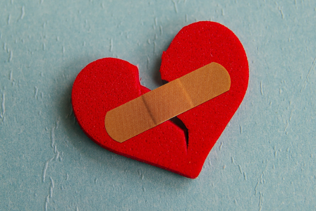 broken heart with band aid