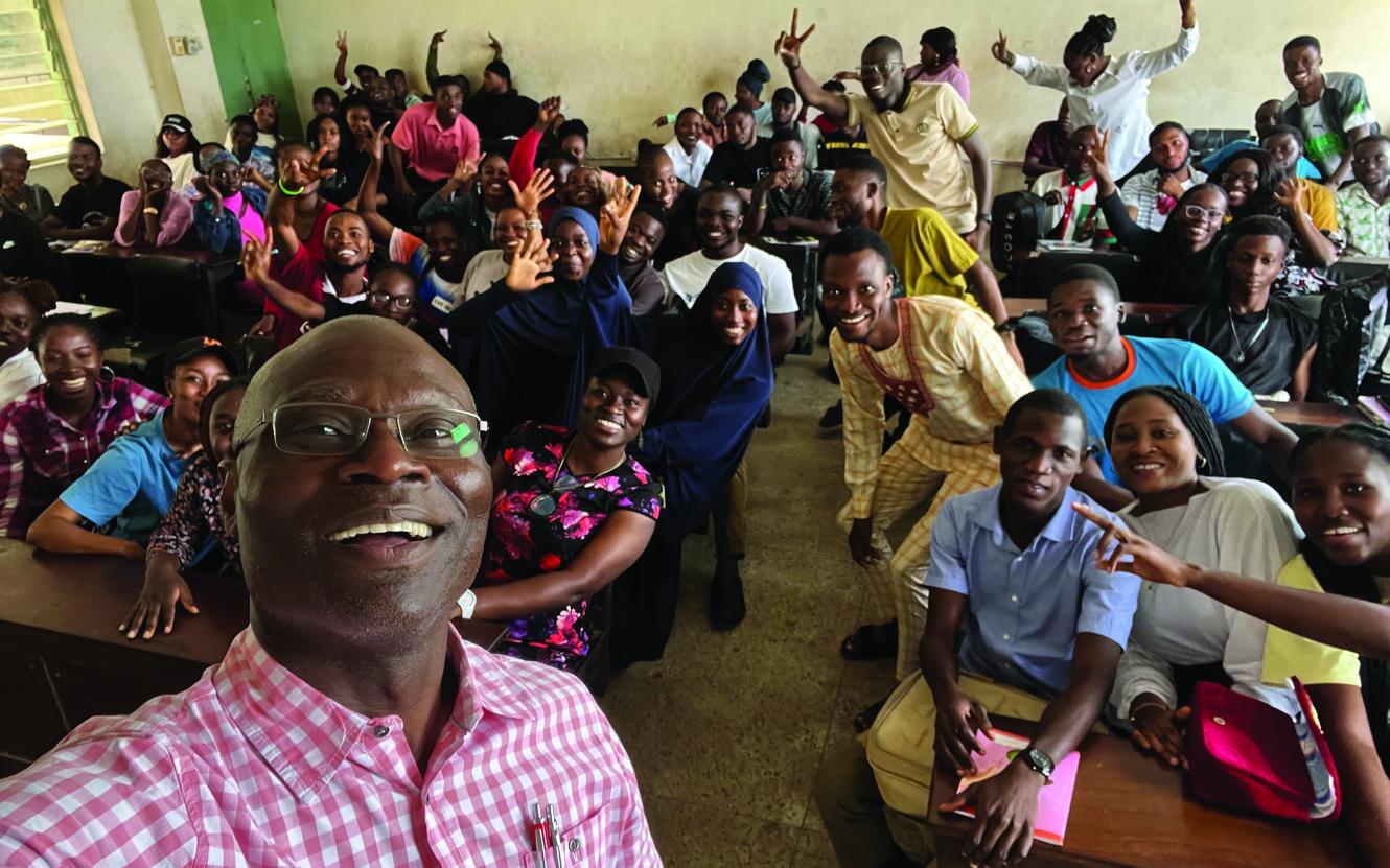 Ag Professor Oluwarotimi Odeh with students in Nigeria