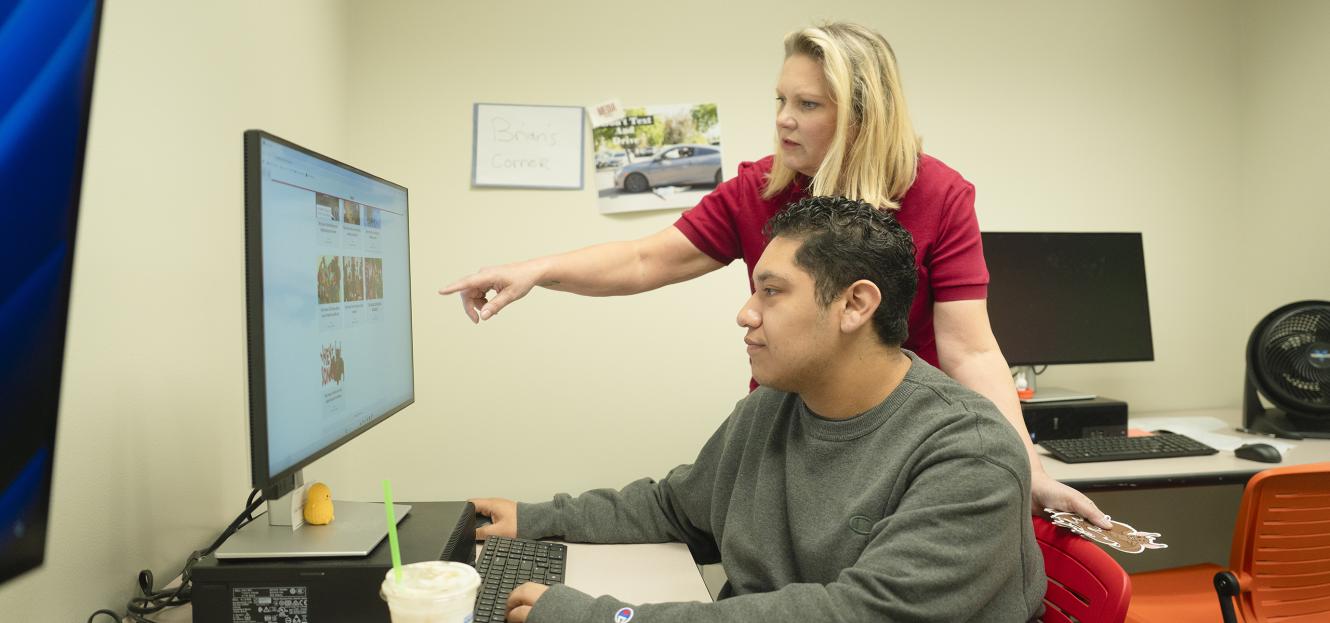 students working on a computer