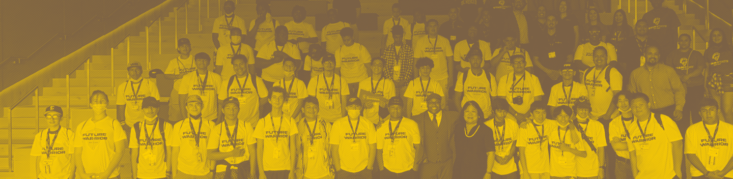 Group shot of 40-plus high school students with President Junn and Dean Harrison.