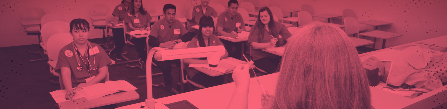 Nursing students seated in a classroom during a lecture.