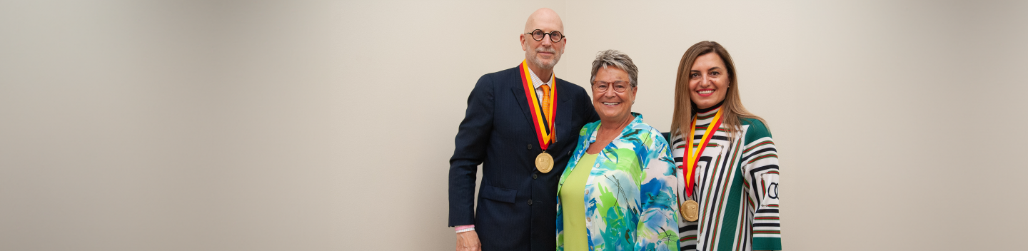 Left to right: Jeffrey Lewis, President Sue Borrego and Adrian Howell.